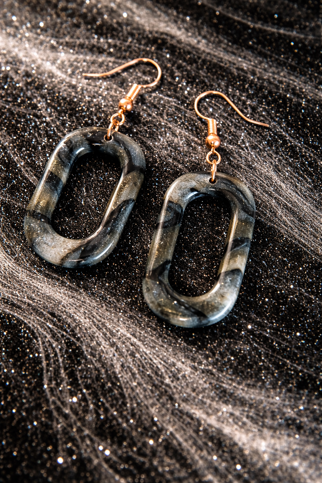 Boucles d'oreilles noir marbré ovale creux