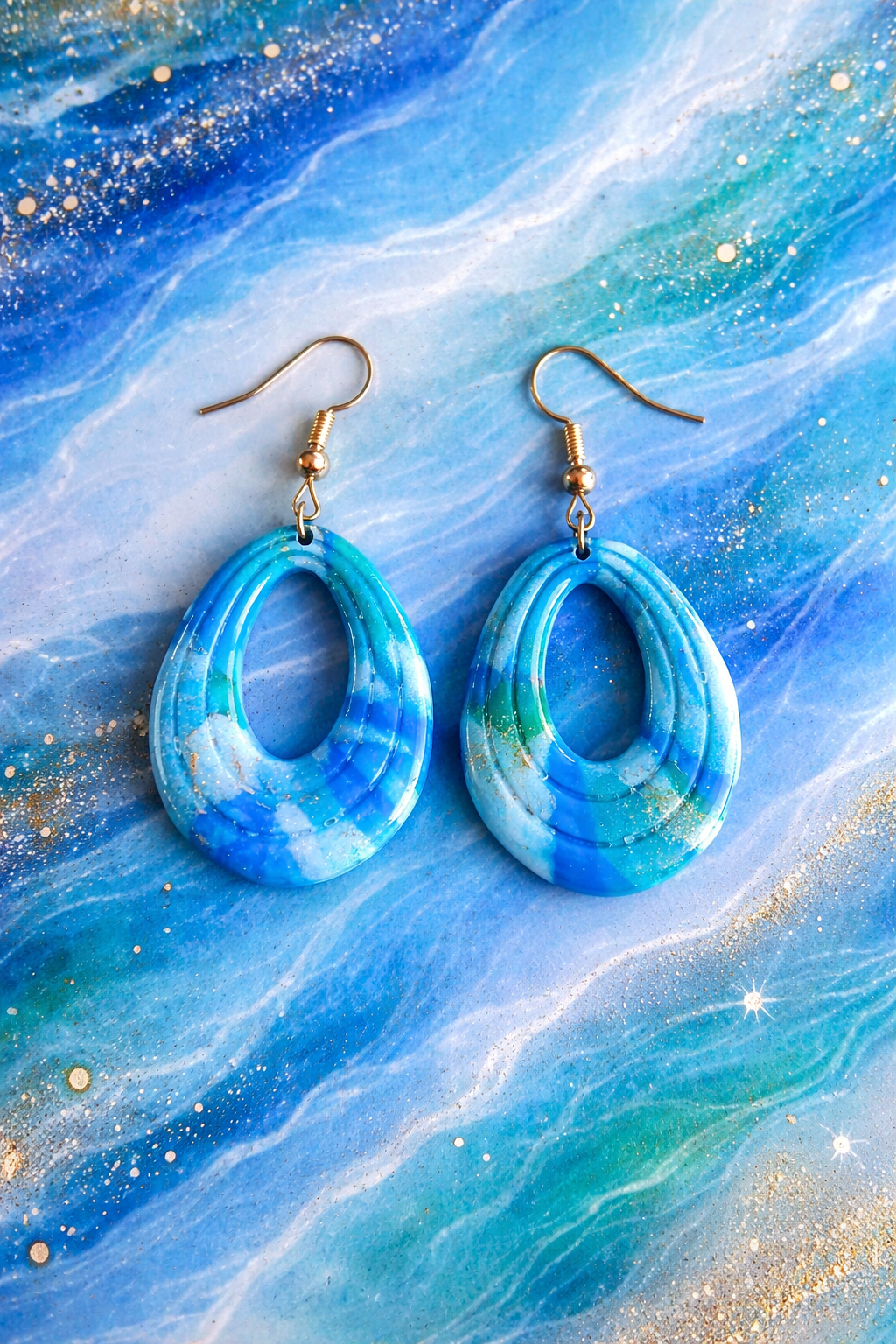 Boucles d'oreilles bleu lagon ovales creuses