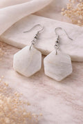 Boucles d'oreilles bouclier